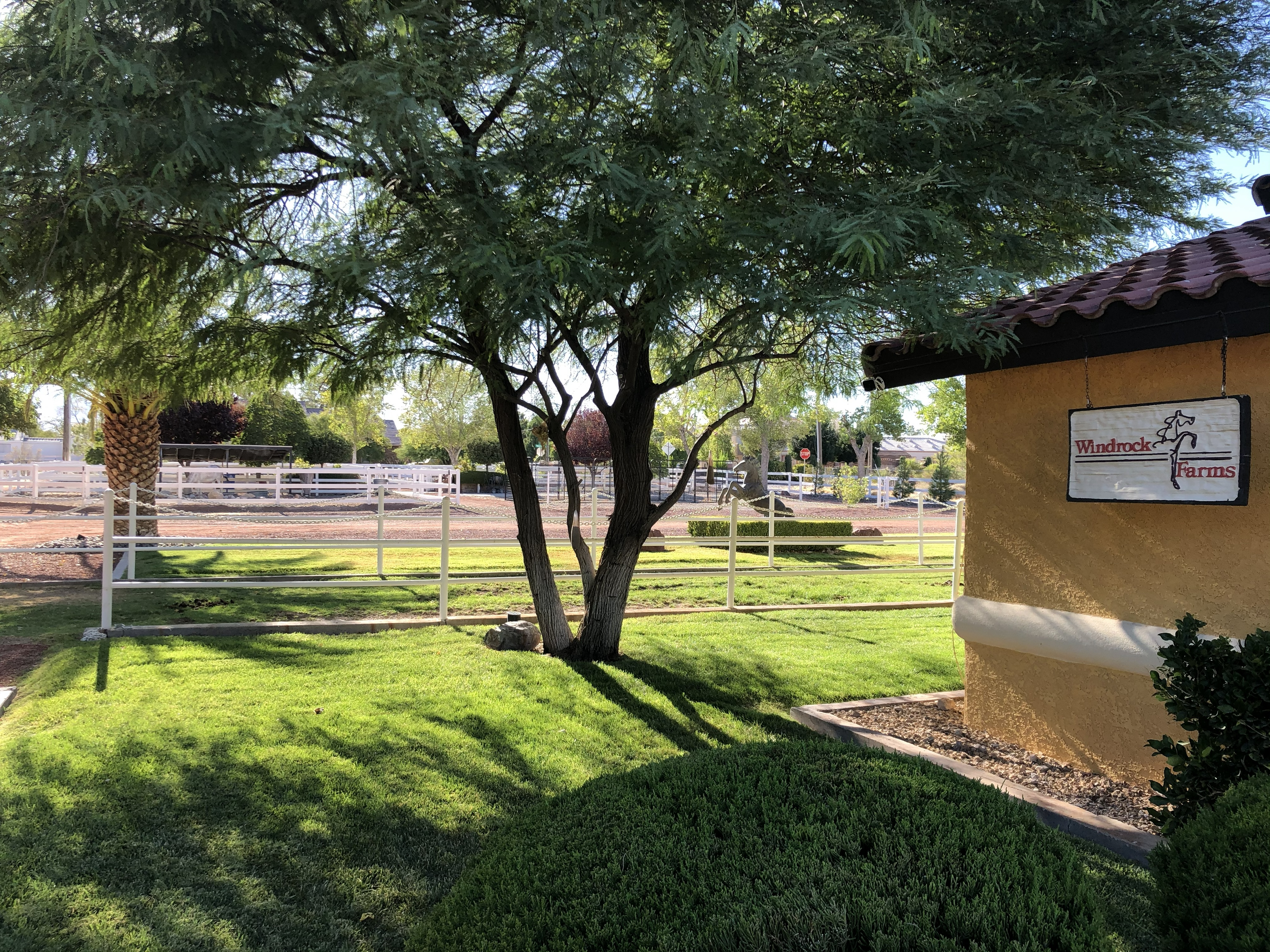 Windrock Farms sign with lush green lawn